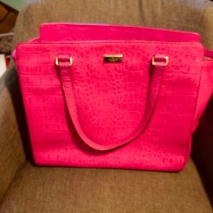 Hot pink Kate spade purse.